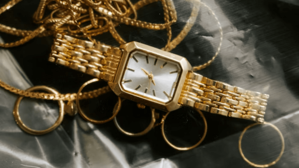 Everyday minimal gold jewellery worn for timeless quiet luxury look