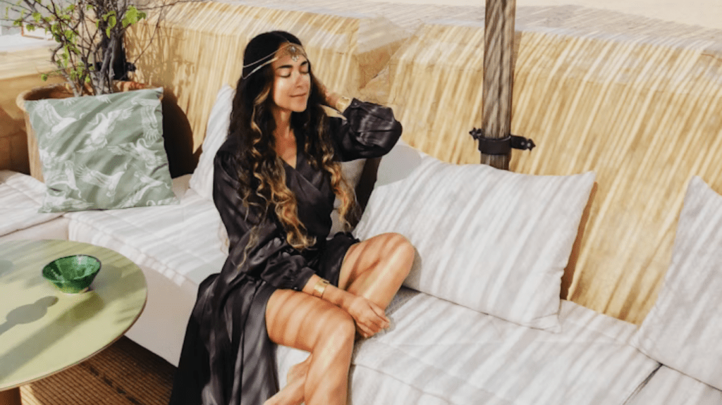 Quiet luxury jewellery styled with neutral tones and natural textures